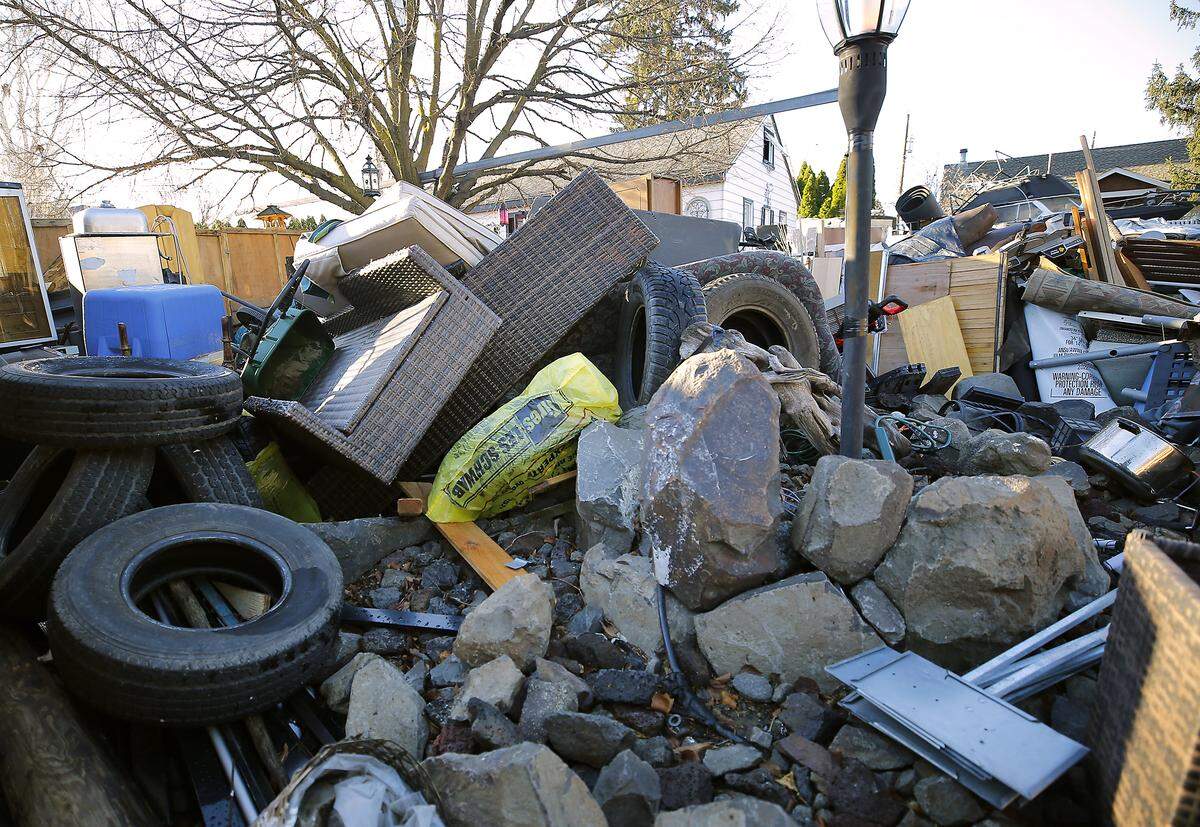 The garbage-clogged home at 1312 Hains Ave.  in Richland sold at a foreclosure auction Friday at the Benton County Justice Center in Kennewick. 