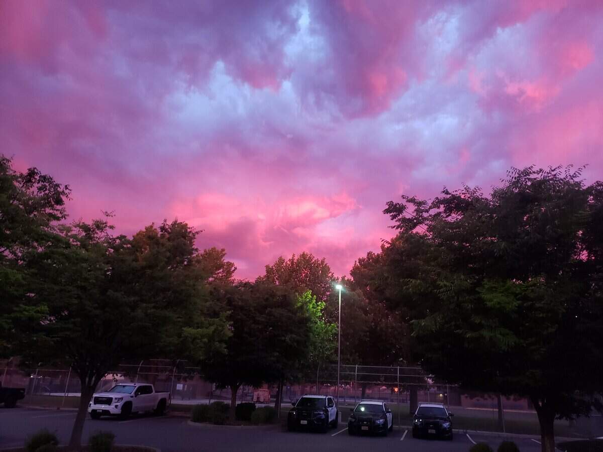 The sky above the Kennewick Police Station during a dawn thunderstorm Saturday.