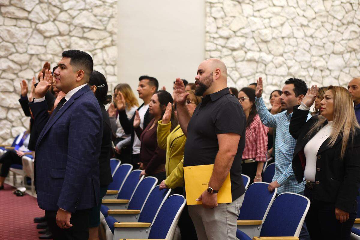 Twenty-six Washington-based immigrants from seven countries were sworn in as new U.S. citizens at U.S. District Court in Richland.