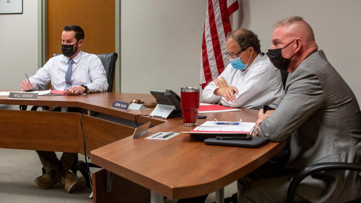 Benton County commissioners, from left, Will McKay, Jerome Delvin and Shon Small debate a sales tax increase to support mental health and chemical dependency services.