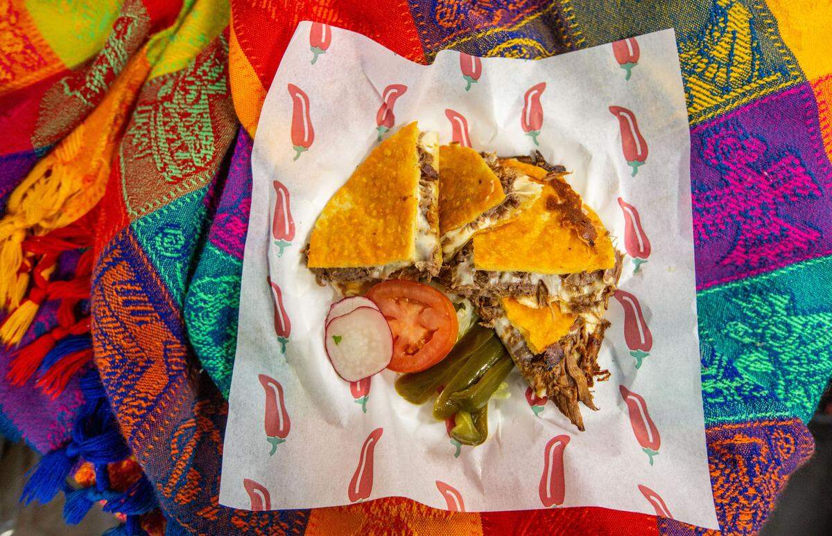 Quesadilla birria plate with consume from Picante Mexican Taqueria food truck.