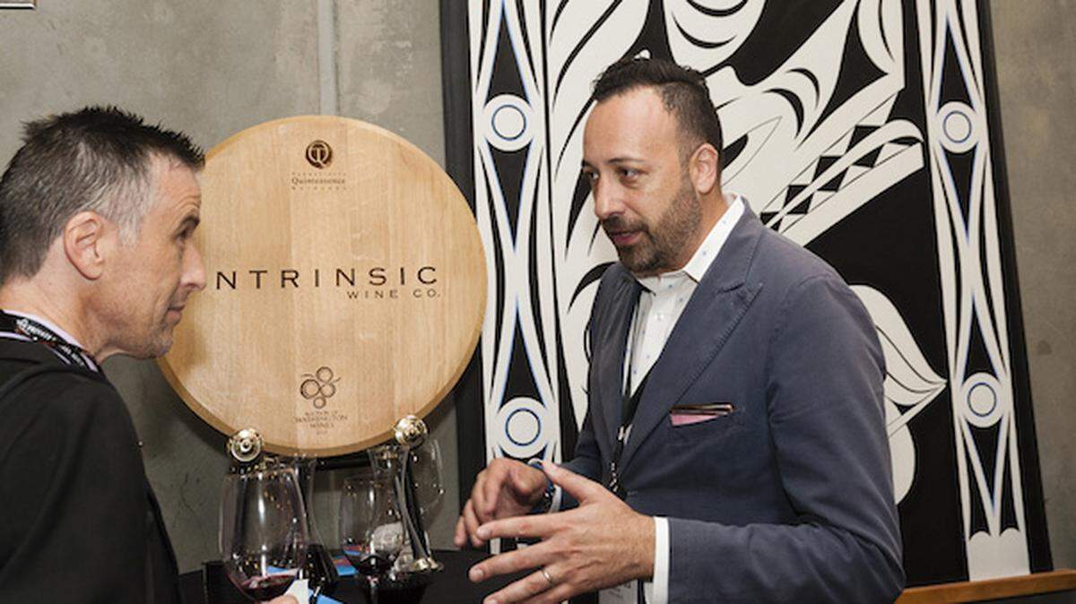 Juan Muñoz-Oca, vice-president of winemaking for Ste. Michelle Wine Estates, shares background on the INTRINSIC Wine Co., during the 2018 Private Barrel Auction in Woodinville, Wash.