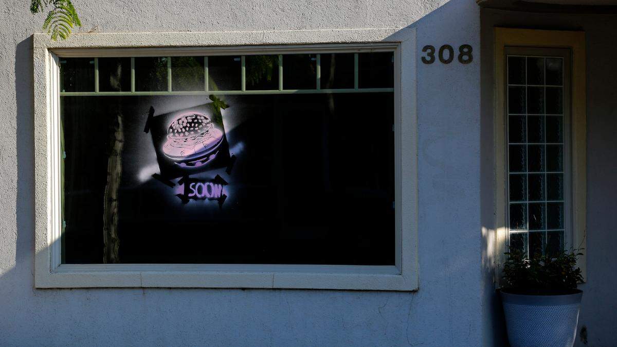 A cryptic clue for a new tenant appears to have been spray painted on the window of the former Foodies restaurant building at 308 W. Kennewick Ave. in downtown.
