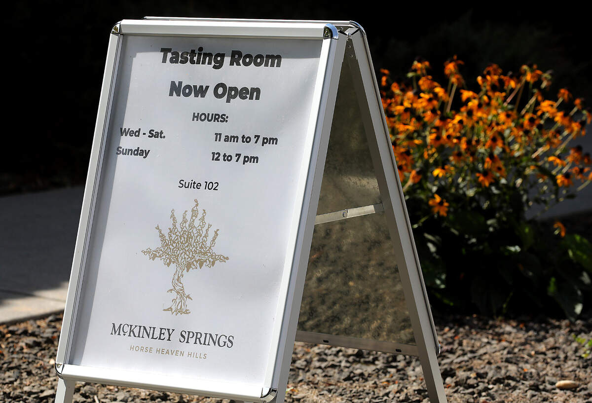A sign displays the hours of operation for the recently opened McKinley Springs Winery and Horse Heaven Wine Co. tasting room. It’s located in the River Walk Village at 400 Bradley Boulevard in Richland.