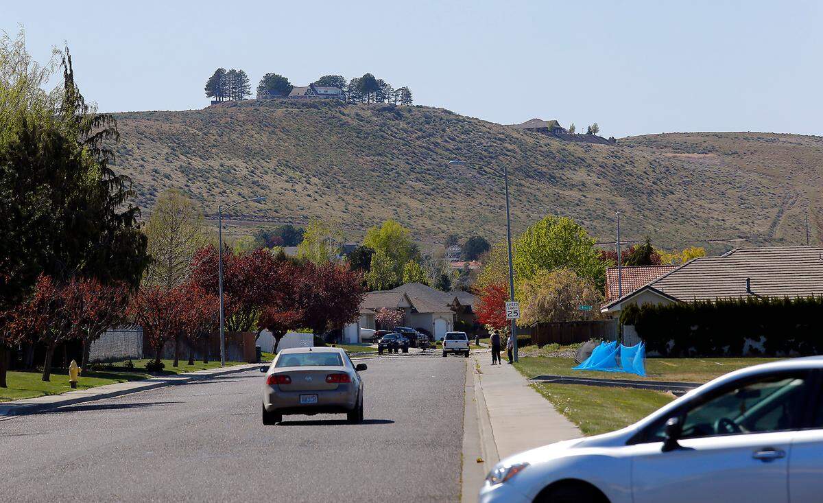 Neighbors oppose a proposal to change the Kennewick comprehensive plan to allow a hotel and restaurant on the top of Thompson Hill and medium density housing below it.