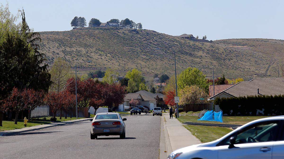 Neighbors oppose a proposal to change the Kennewick comprehensive plan to allow a hotel and restaurant on the top of Thompson Hill and medium density housing below it.
