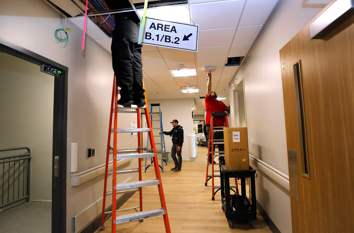 Construction workers putting on the finishing touches of the new 101,000-square-foot Prosser Memorial Health hospital at 200 Prosser Health Drive in Prosser.