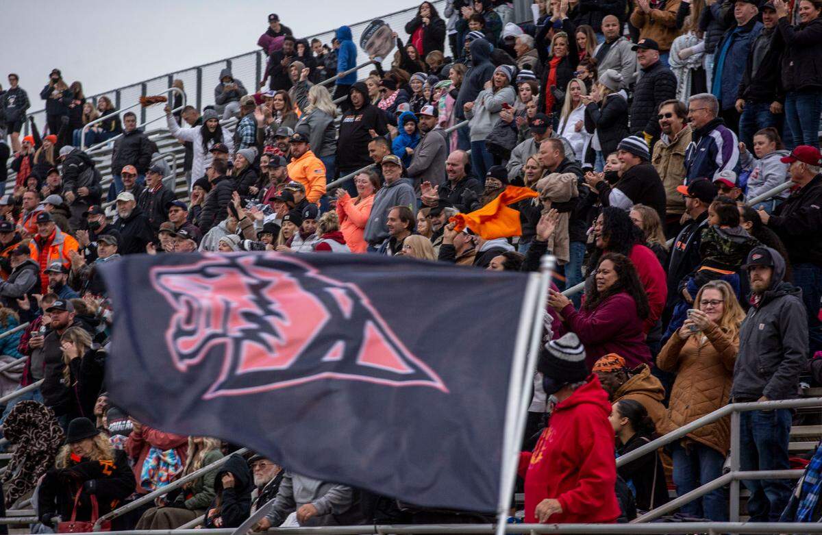 Fans cheer on the Kennewick Lions after their 26-21 victory over the Spanaway Lake Sentinels at the Neil F. Lampson stadium in Kennewick on Saturday. The Lions will advance to the 3A state quarterfinals.