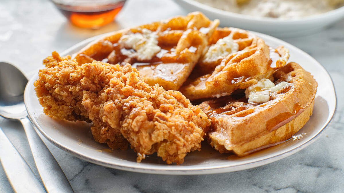 An image of chicken and waffles. .