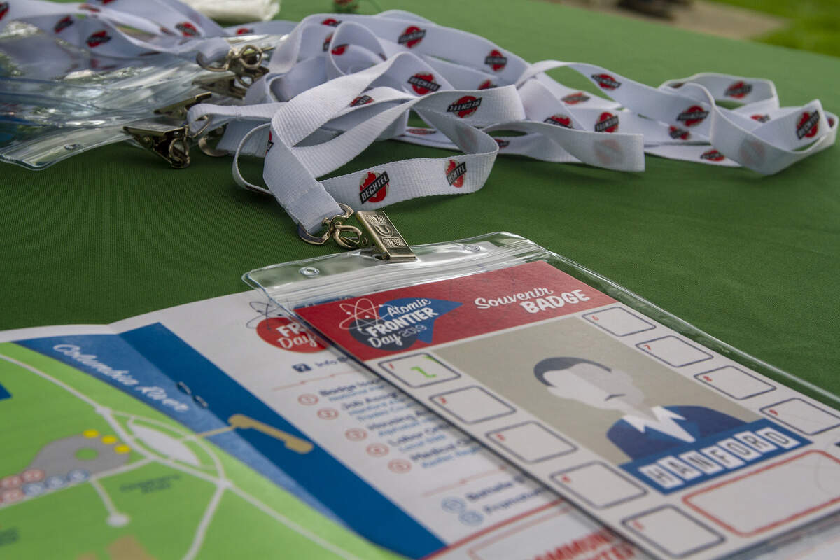 Attendees were given Hanford badges during Atomic Frontier Day’s at Howard Amon Park in Richland on Saturday and walk through the steps of getting a badge while seeing historical exhibits.