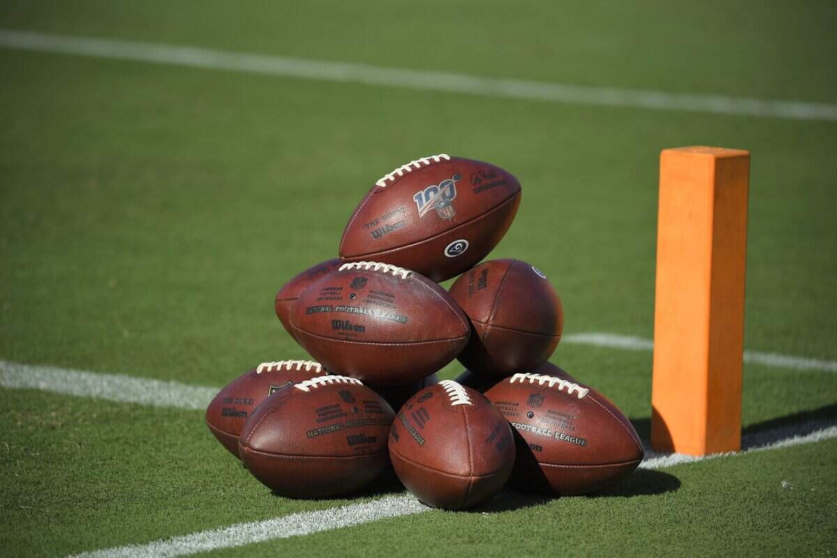 When will this--footballs stacked for players to use on an NFL field--happen again amid the coronavirus pandemic?