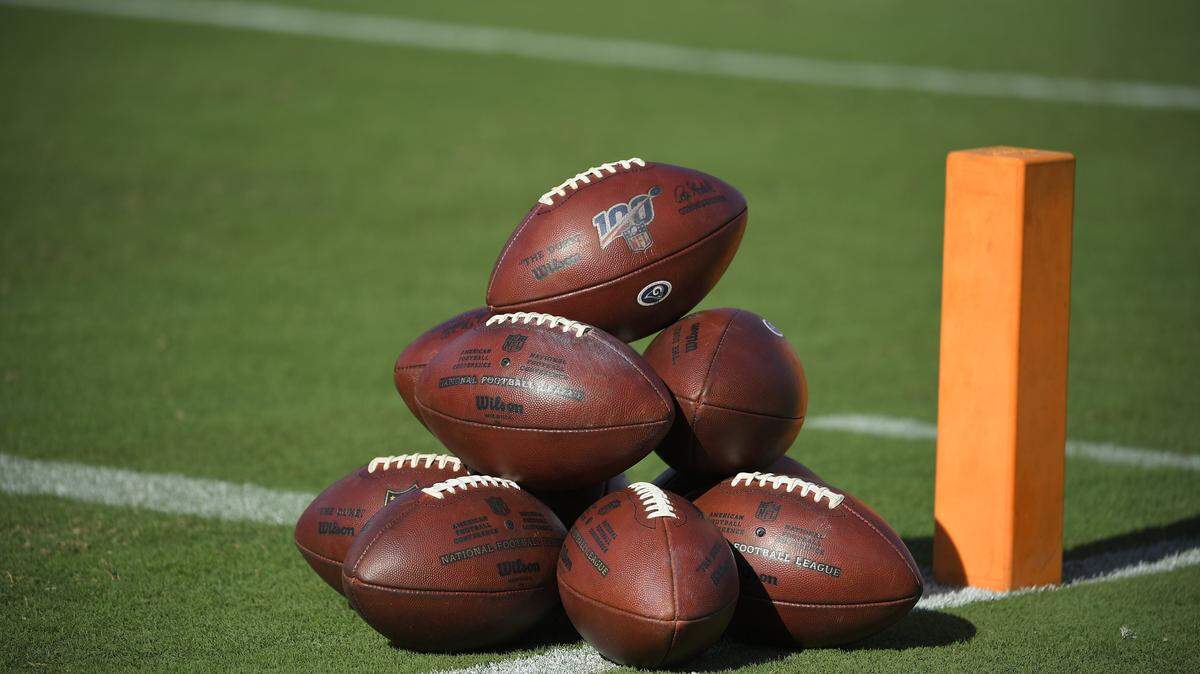 When will this--footballs stacked for players to use on an NFL field--happen again amid the coronavirus pandemic?