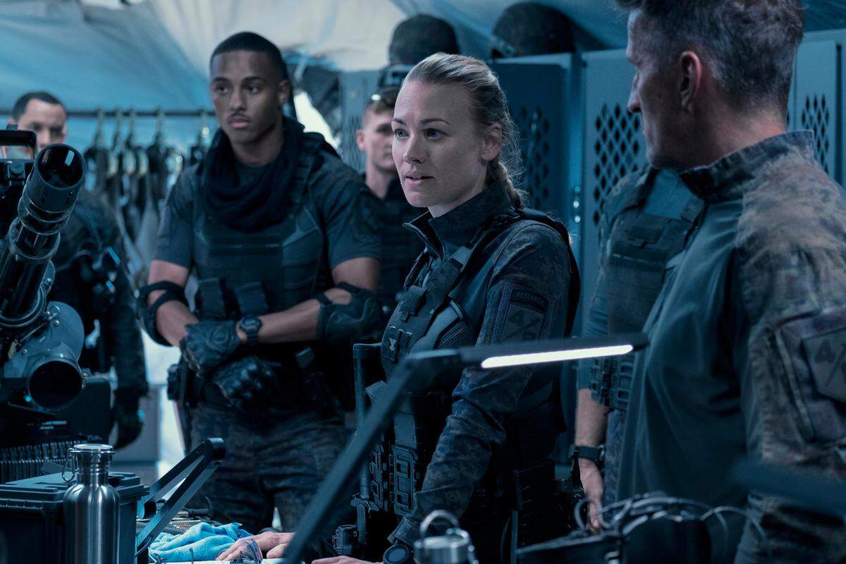 Keith Powers and Yvonne Strahovski star in “The Tomorrow War.”