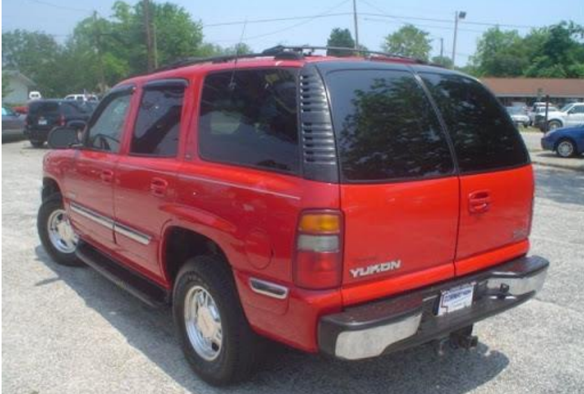 The Washington State Patrol is looking for a red SUV that looks similar to this GMC Yukon with rear-end damage.