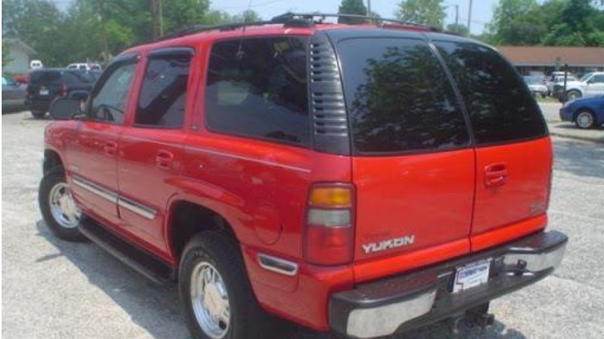 The Washington State Patrol is looking for a red SUV that looks similar to this GMC Yukon with rear-end damage. They believe it was involved in a hit-and-run.