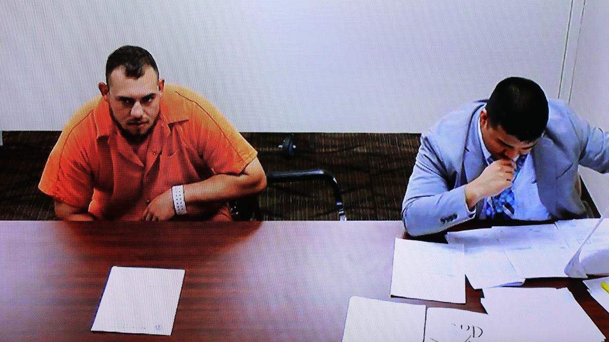 Robbery and assault suspect Pedro Sarabia appears in Franklin County Superior Court via a video line Wednesday afternoon with provisional public defense attorney Michael Nguyen.