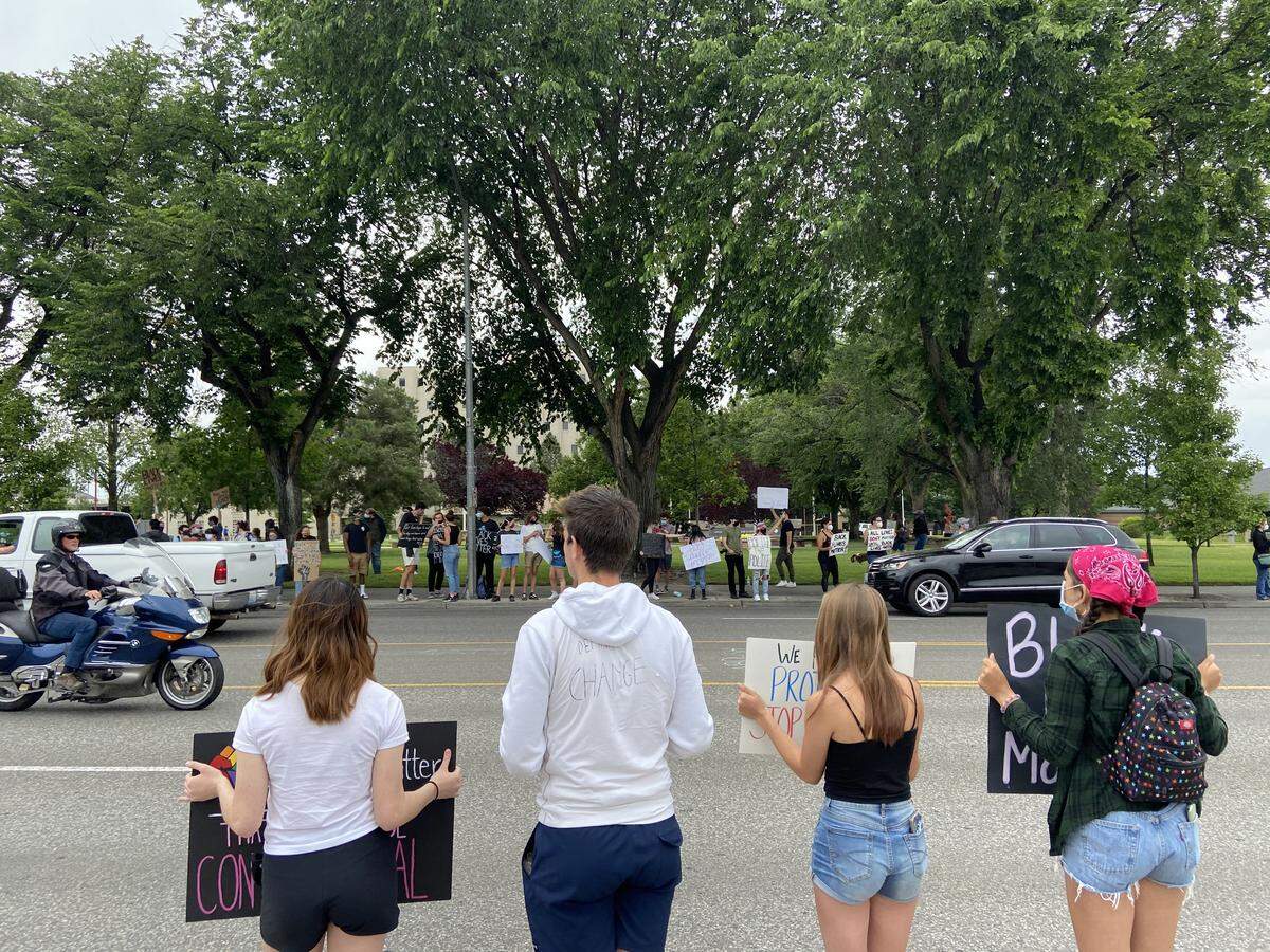 About 300 protesters rallied along George Washington Way in Richland on Friday. Two more demonstrations are planned Friday night and Saturday in Pasco.