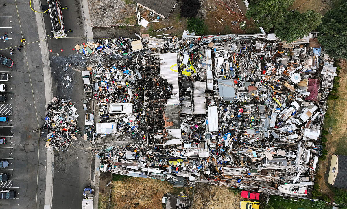 A two-alarm fire broke out at a notorious “junkyard” house at 2100 Pullen St. in Richland.