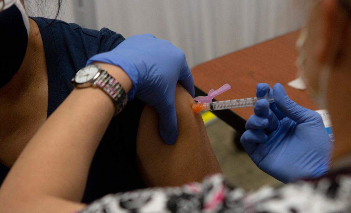 COVID-19 vaccination clinic at Tri-Cities Community Health in Pasco.