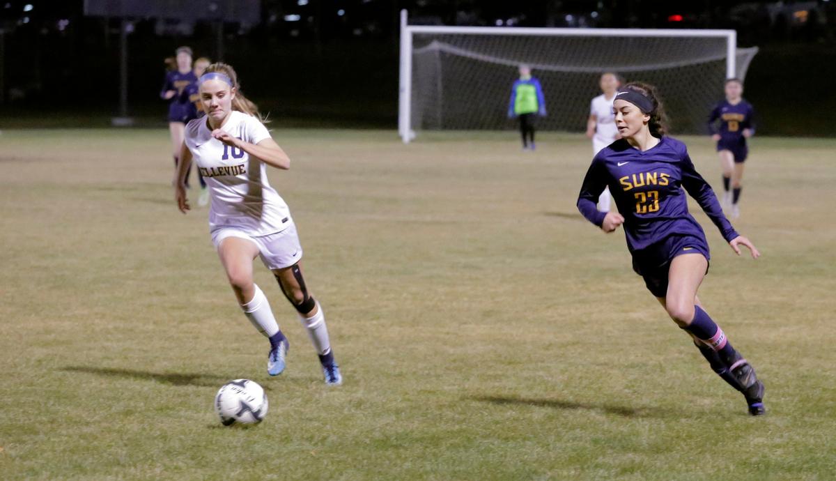 Southridge forward Kassadi Suitonu (23) and Bellevue’s Zoe Fowler battle for control of the ball during Wednesday’s game in Kennewick.