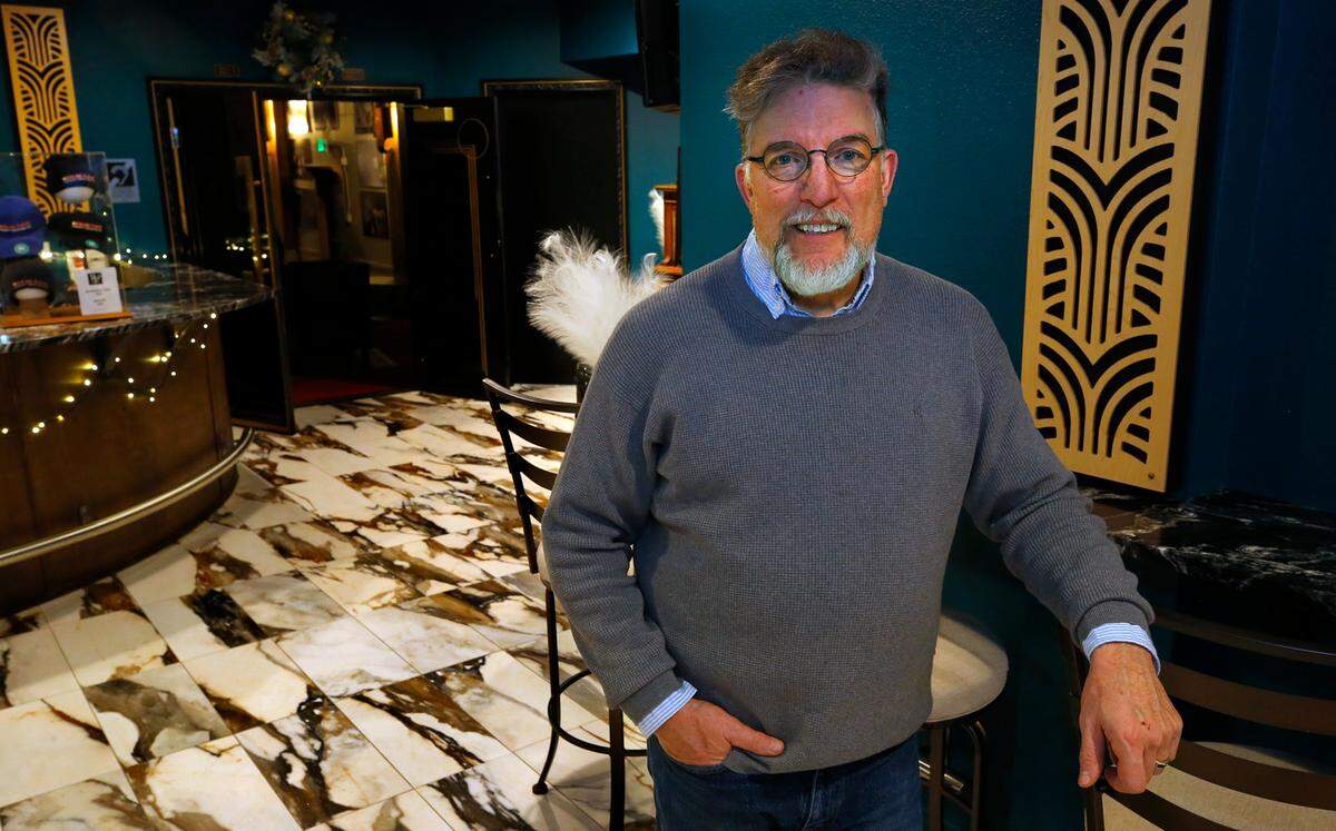 Ron Harman, vice president of operations, stands in the lobby of the historic Richland Players performing arts theater building at 608 The Parkway in Richland.