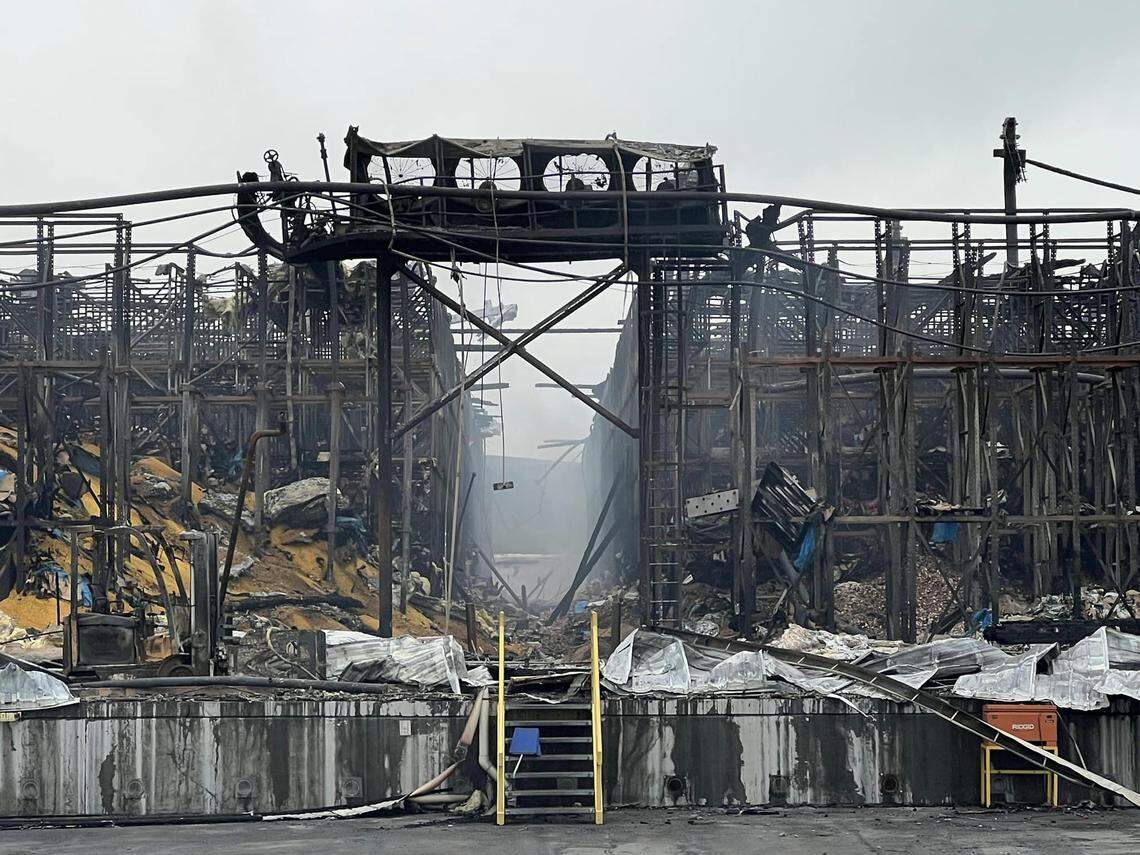 Piles of vegetables and packing materials remain in the shell of the older part of the Lineage Logistics cold storage warehouse in Finley