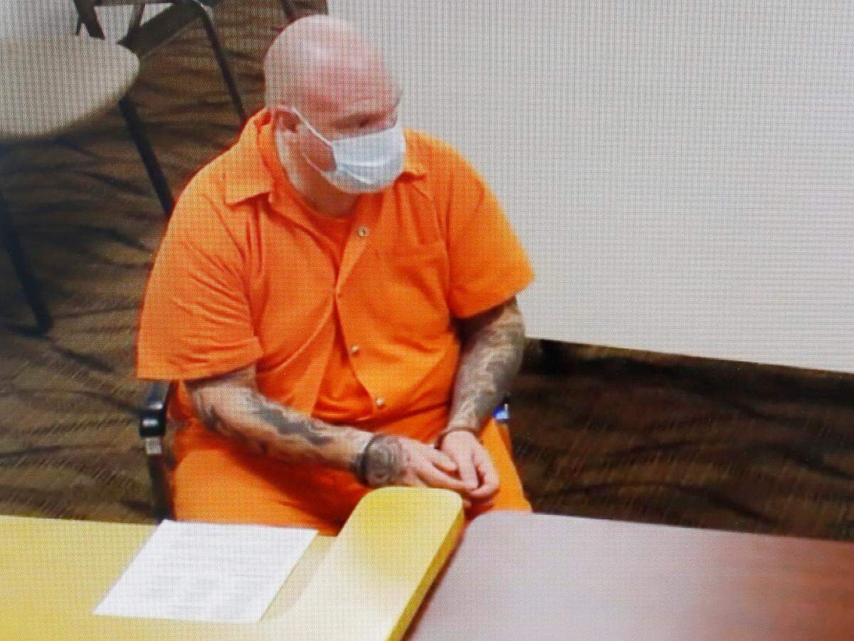 Soap Lake reserve police officer Shane W. Jones, 49, appears in Franklin County Superior Court Friday via a video link. The K9 handler is accused of driving drunk when he wrecked a patrol car north of Pasco.