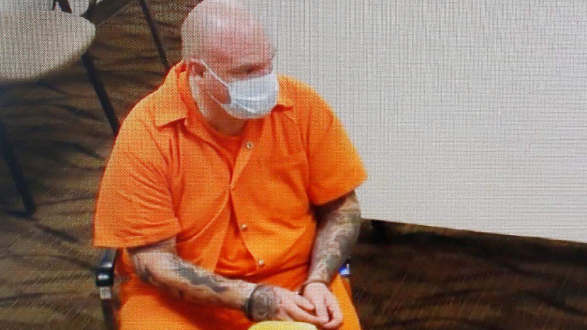 Soap Lake reserve police officer Shane W. Jones, 49, appears in Franklin County Superior Court Friday via a video link. The K9 handler is accused of driving drunk when he wrecked a patrol car north of Pasco.