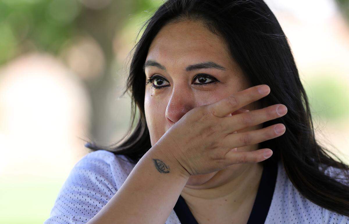 Sandra Ramirez wipes away tears while recounting the death of her 13-year-old son, Joseph Martinez, after three teens found a gun in a Kennewick home more than two years ago.