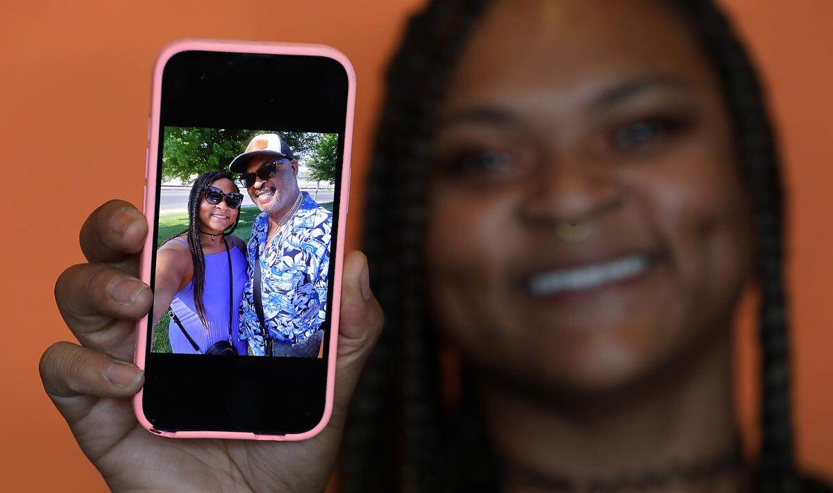 Aubrieann Johnson holds up her phone with a photo of herself with her father, Aubrey Lee Johnson, taken this past summer in Pasco. She praises him as her main encourager for starting her gourmet banana bread baking business called Aub’s Bananza Bread. He’s also the official taste tester for his daughter because she openly admits to not being a banana bread afficianado.