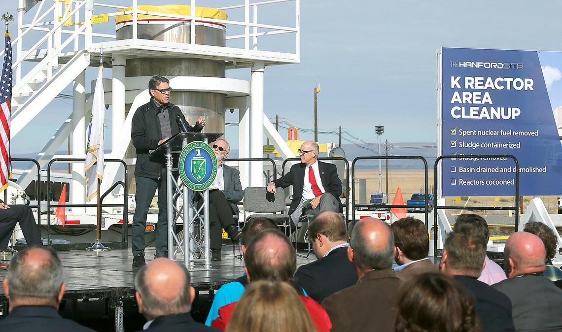 Energy Secretary Rick Perry speaks Tuesday at the gathering to congratulate Hanford workers for the completion of moving radioactive sludge from underwater storage at the K reactor area to dry storage in central Hanford. The 25-year cleanup project helps protect the Columbia River. Seated to the right of Perry is Rep. Dan Newhouse, R-Wash., and Rep. Greg Walden, R-Ore. Watch a video at: tricityherald.com/video