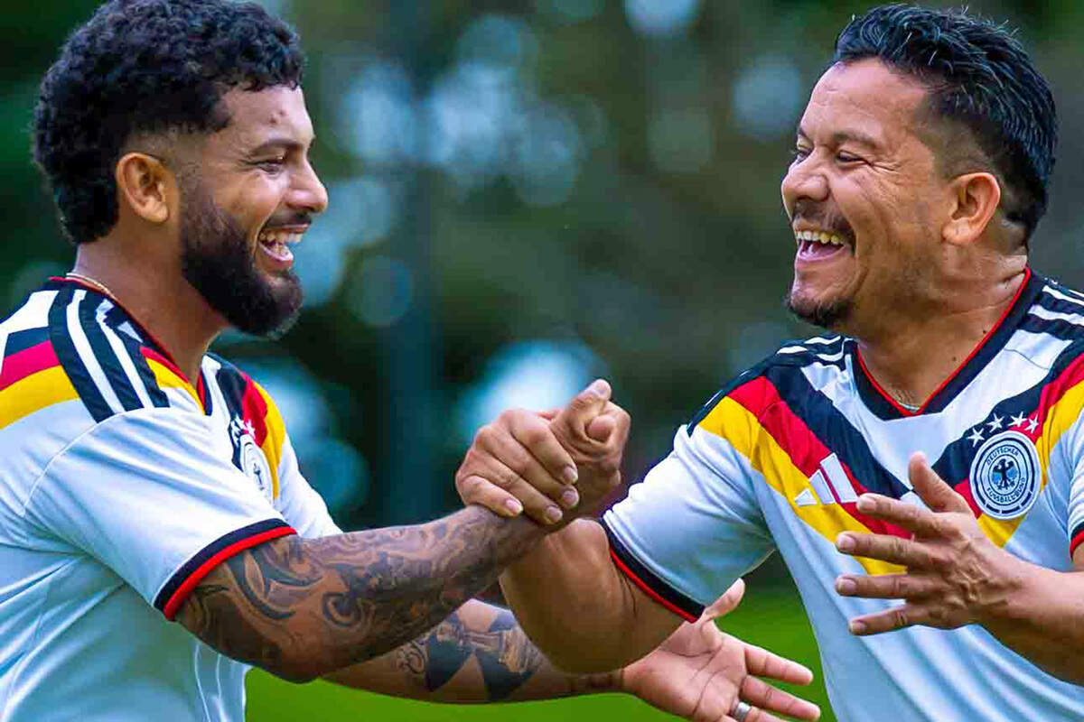 Alex Castro, left, celebrates with teammate Jorge Alvarado after scoring