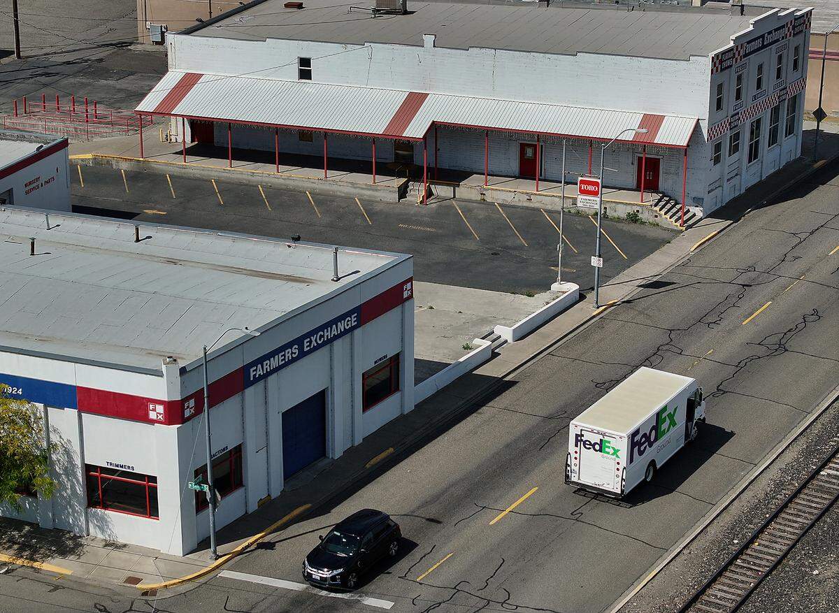 The historic Farmers Exchange, once a vital hub in downtown Kennewick, sold in a foreclosure auction as Banner Bank took ownership of the property.