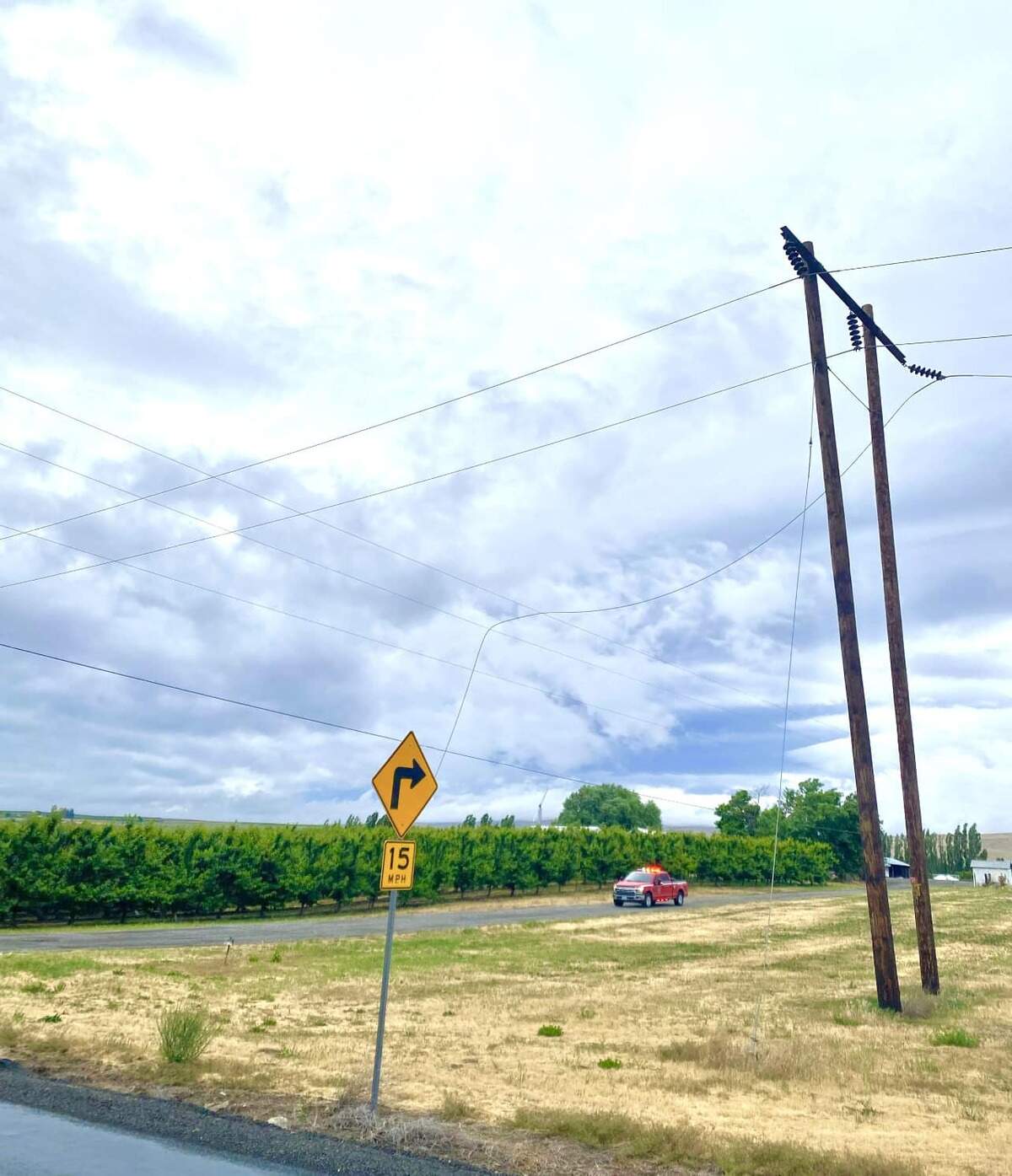 A helicopter clipped a power line as it worked to dry cherries near Benton City Sunday.