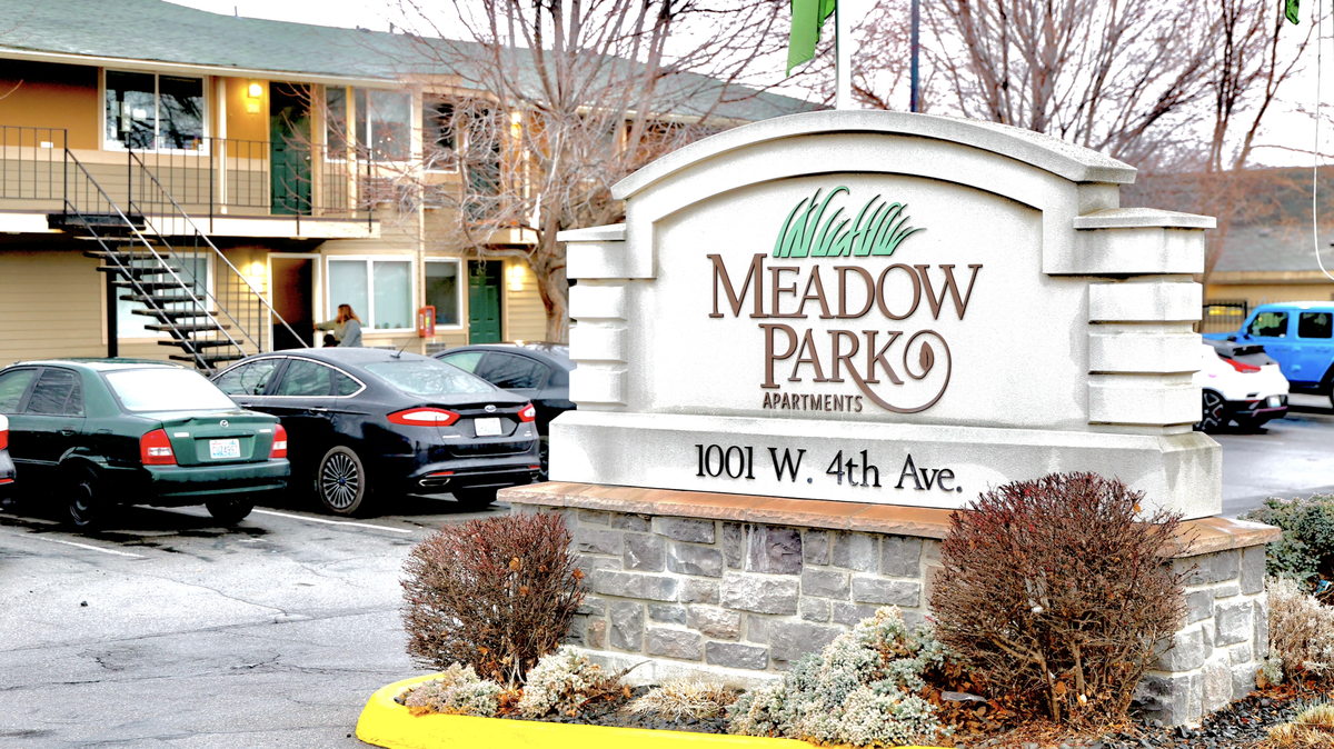 A former apartment manager for Meadow Park Apartments is accused of siphoning rent from two vulnerable tenants to pay for her sister.