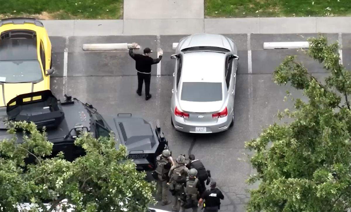 A police drone image of a search warrant arrest at an apartment unit in the 1100 block of W 10th Avenue in Kennewick and a residence in the 900 block of Benham Street in Richland in August 2025.