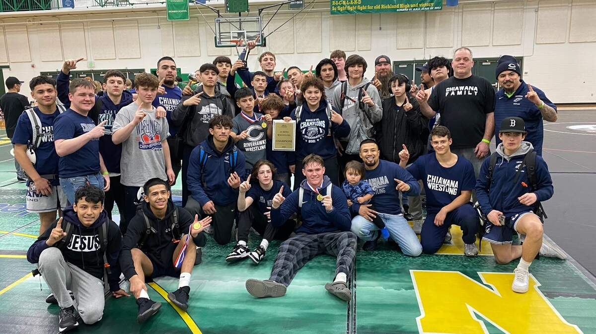 The Chiawana boys wrestling team celebrated their district championship on Saturday at Richland High School.