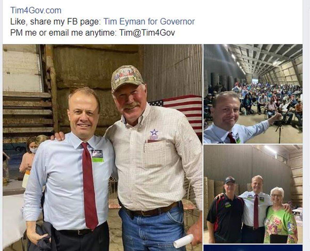 Anti-tax activist and gubernatorial candidate Tim Eyman stands with Franklin County Commissioner Clint Didier at a recent “farm hall” meeting of the Franklin County Republican Party in Eltopia held in defiance of COVID distancing restrictions.