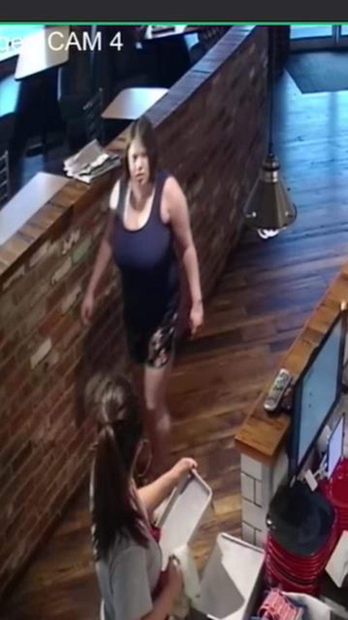 Police are looking for this woman after she hit a fast food employee with a sandwich in a west Kennewick restaurant.