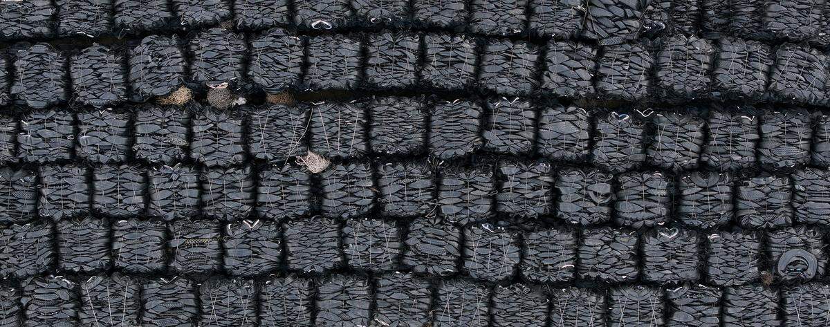 The abandoned former recycling business on Twin Bridges Road is the largest stockpile of used tires on an unlicensed site in the state.