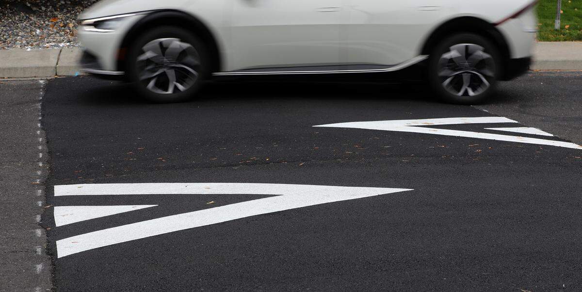 A vehicle travels over a recently installed speed bump on Canyon Lakes Drive near South Morain Place in Kennewick.