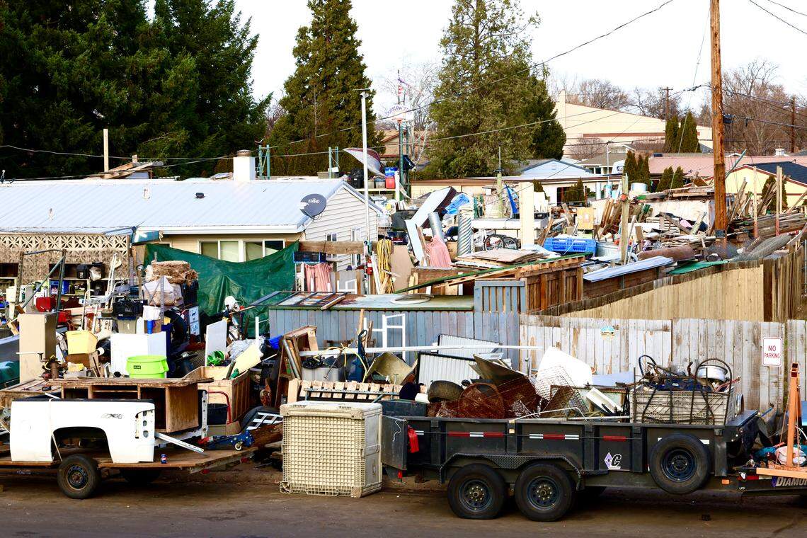 Taylor Knipp is in the middle of a legal fight with the city of Richland over the “mountain of debris” that has engulfed his property.