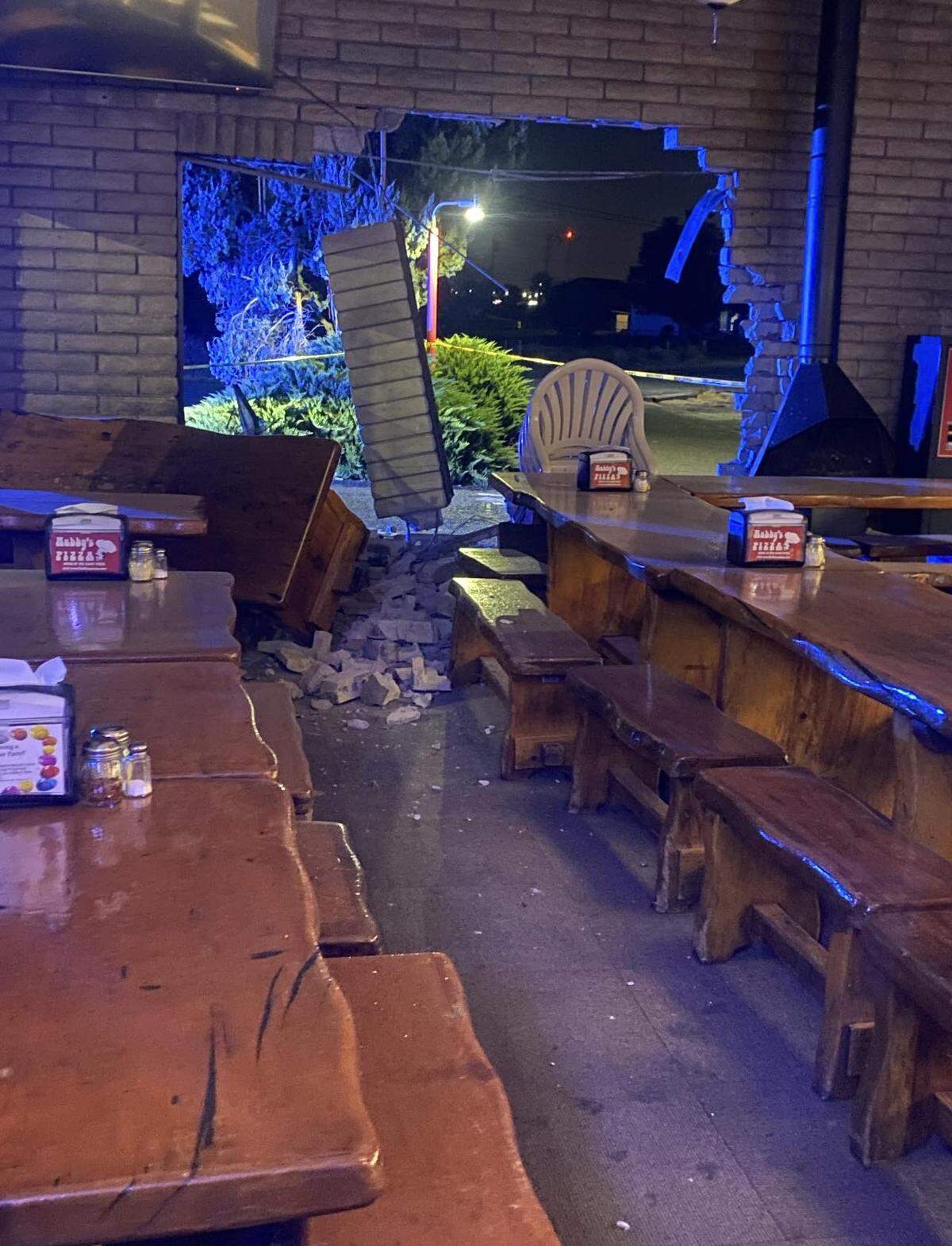 A suspected thief in a stolen Hyundai Elantra slammed through the wall of Hubby’s Pizza early Thursday.