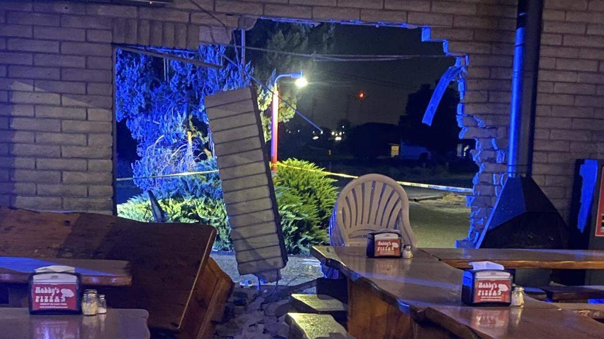 A suspected thief in a stolen Hyundai Elantra slammed through the wall of Hubby’s Pizza early Thursday.