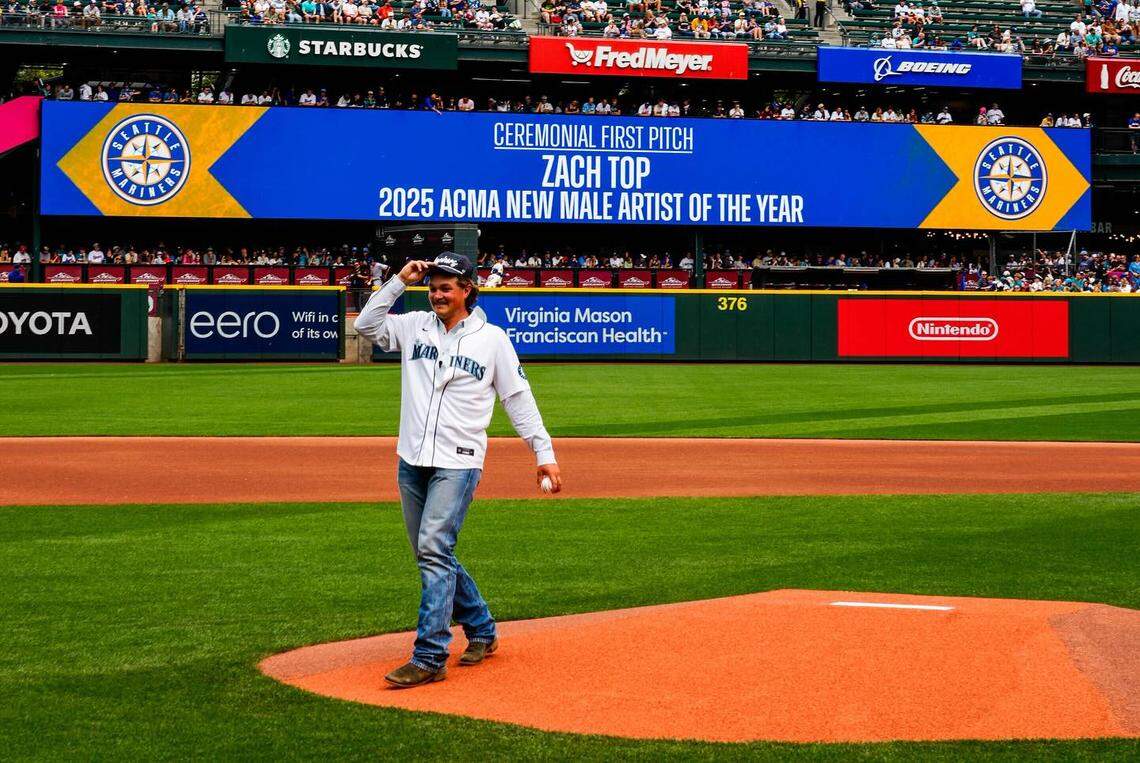 Zach Top throws the ceremonial first pitch at a Seattle Mariners game.