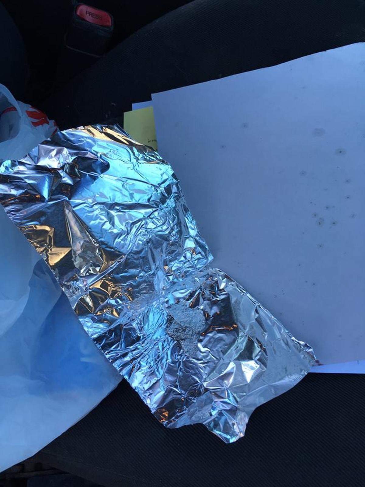 Kennewick police found suspected narcotics and narcotic paraphernalia on Jake McChesney when they found him passed out in a car at Clearwater Avenue and Edison Street.