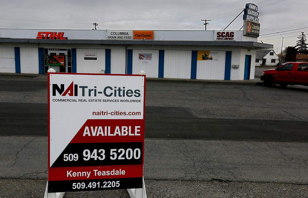 A for sale sign sits outside Columbia Grain & Feed building at 2001 W. Lewis St. in Pasco.