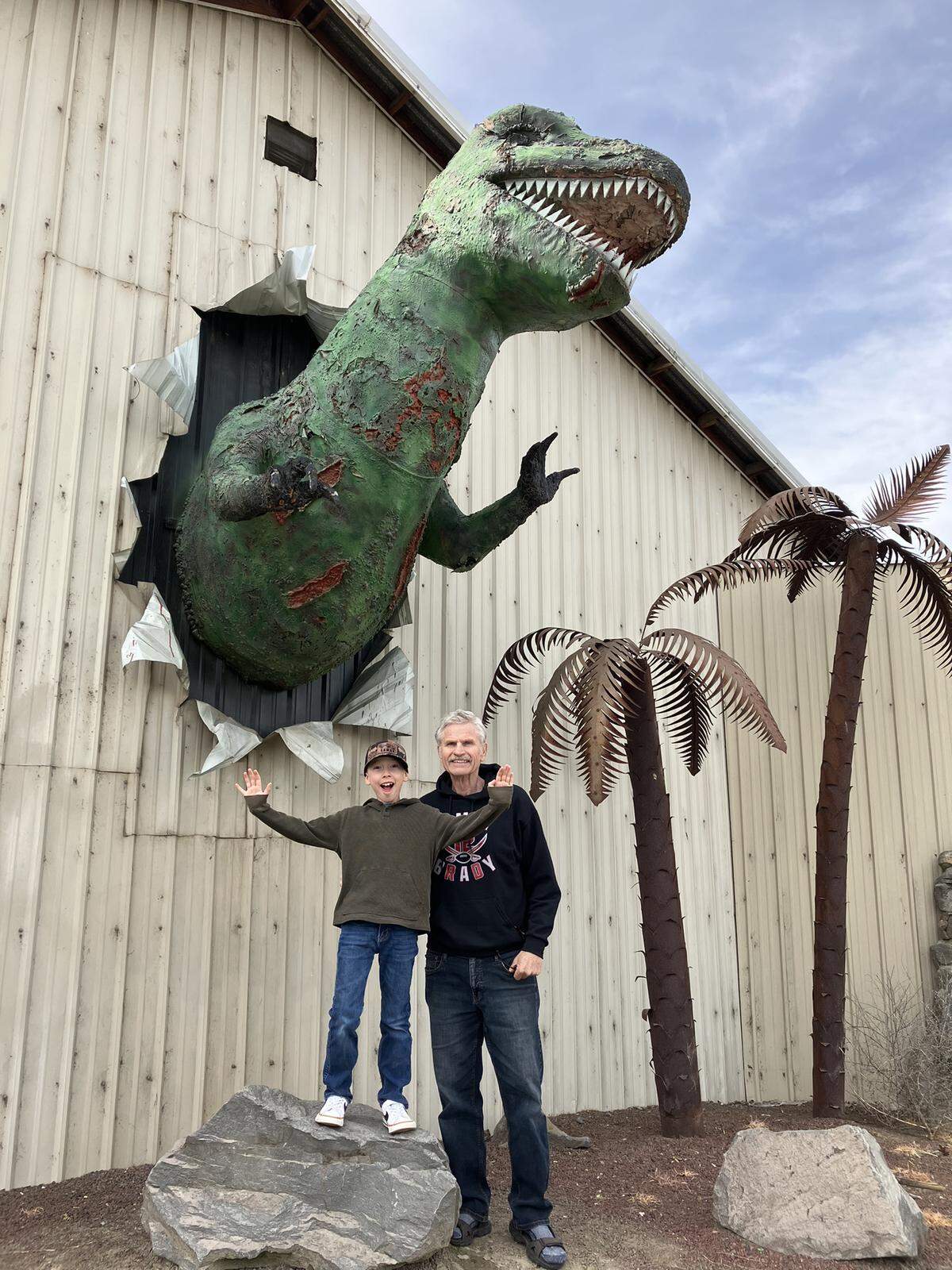 Lee Walter and his grandson find adventure at the dinosaur park in Granger, Washington.