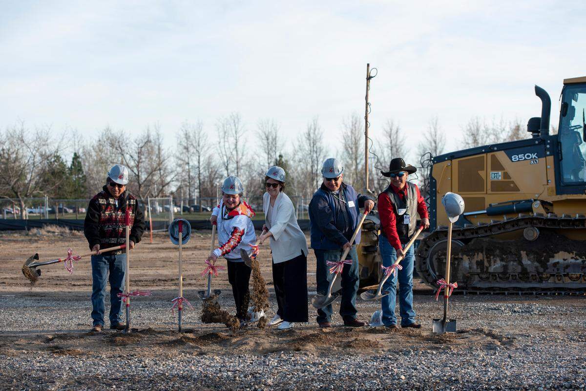 Members of the Yakima Nation Tribal Council, from left, Raymond Smartlowit, Cheryl Phillips, Dana Miller and Terry Heemsah break ground with WSU Tri-Cities Chancellor Sandra Haynes during a ceremony for a new academic building in Richland.