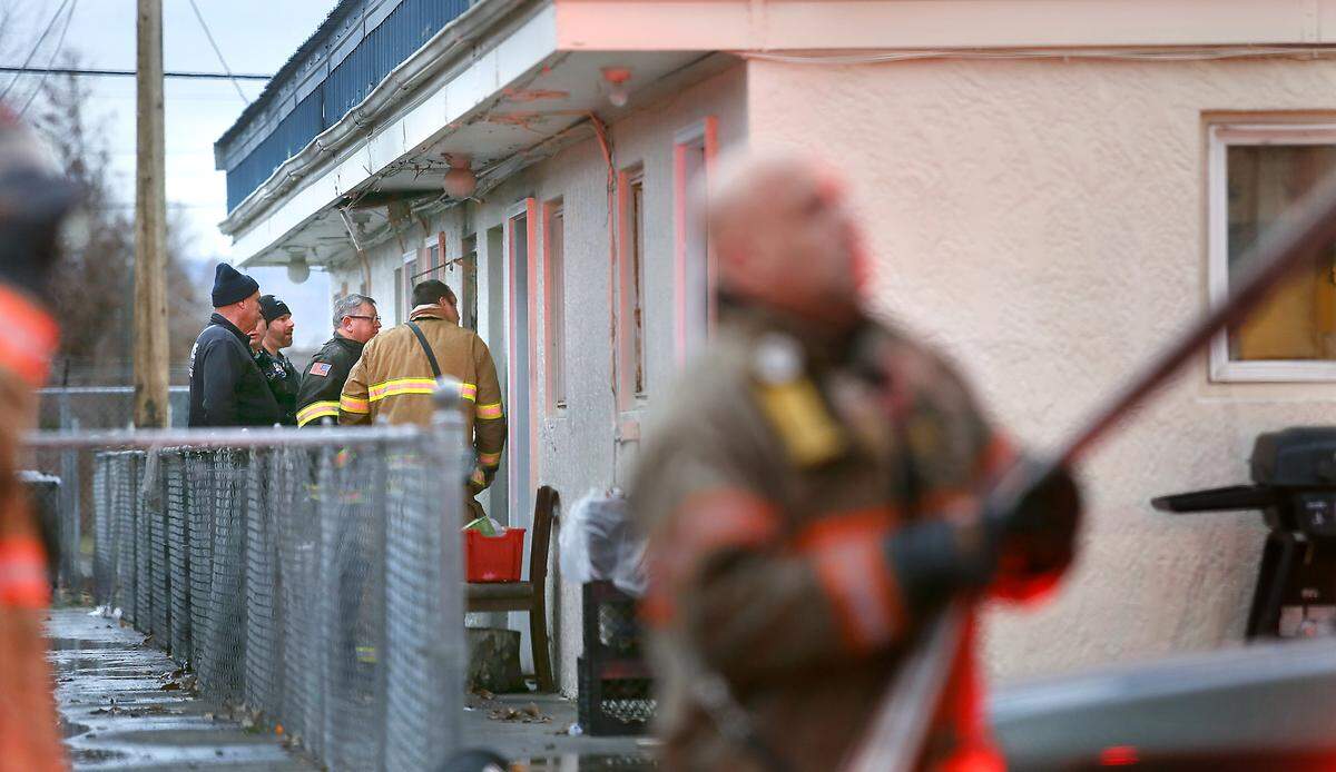 Pasco fire and city officials investigate a fire Thursday in an apartment complex at 936 West Ruby Street in Pasco. Deputy Fire Chief Ed Dunbar said no one was home when the fire started, possibly by some clothes left on an electric portable heater in a bedroom. Fire crews from Pasco, Kennewick and Franklin Fire District 3 responded. Watch a video at: tricityherald.com/video